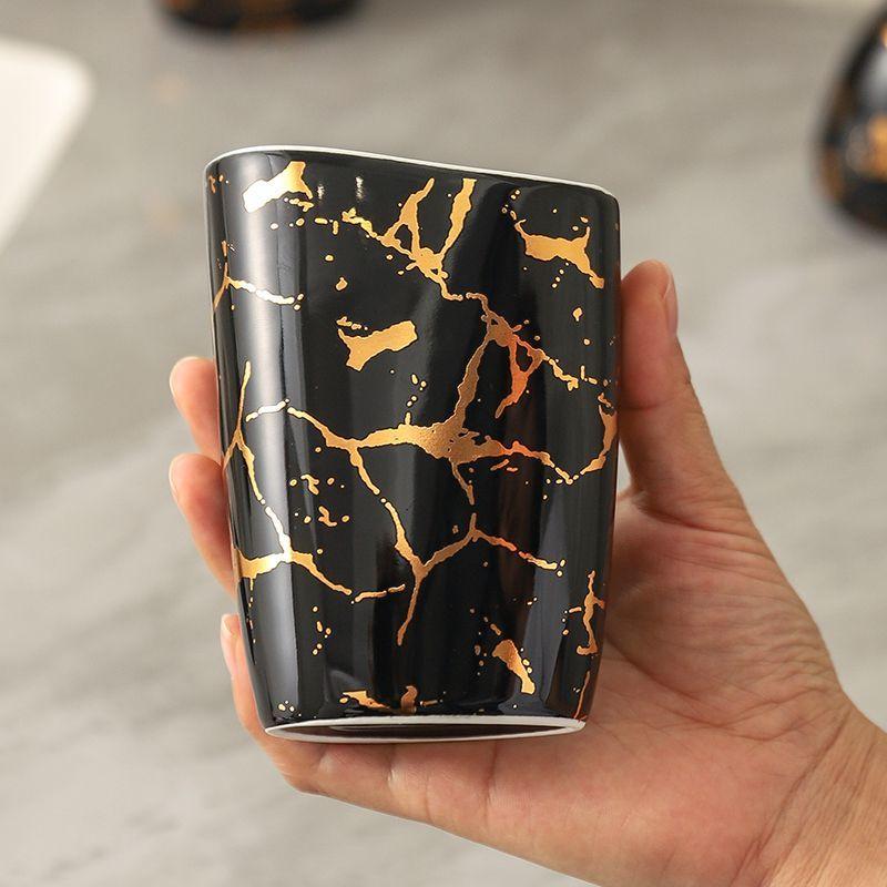 Exquisite Gold Plated Black Ceramic Bathroom Set Lotion Bottle Soap Dispenser Household Mouthwash Cup Dish Bathroom Accessories