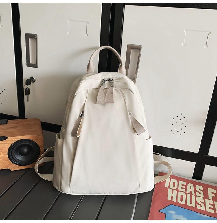 

Школьный рюкзак 2025 новый универсальный рюкзак большой вместимости высокая ценность однотонный простой рюкзак для отдыха на открытом воздухе