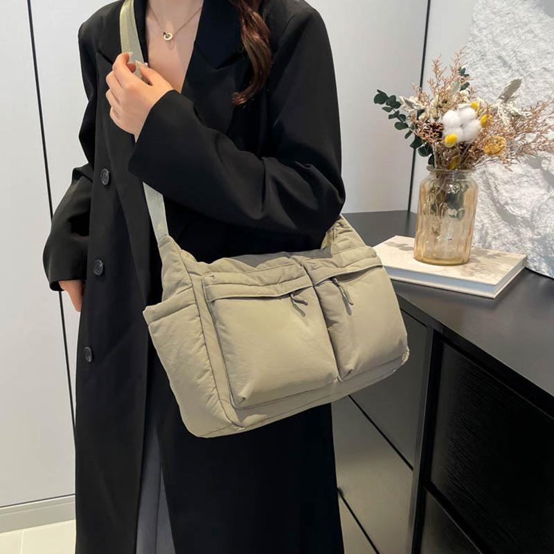 Unisex vodoodpudivá nylonová crossbody taška s více kapsami