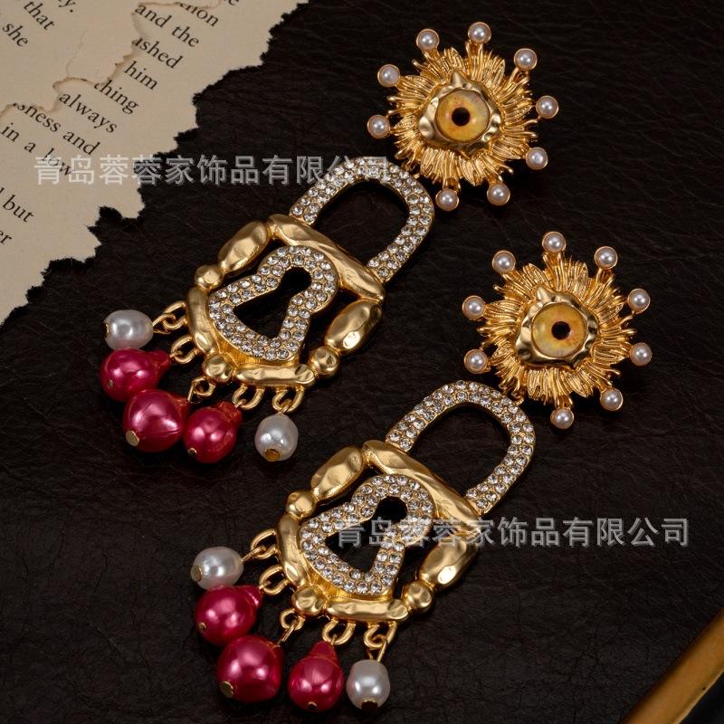 Middle Aged High-end Earrings Xiapa Runway Style Sun Eye Lock Pearl Exaggerated Personality Feel