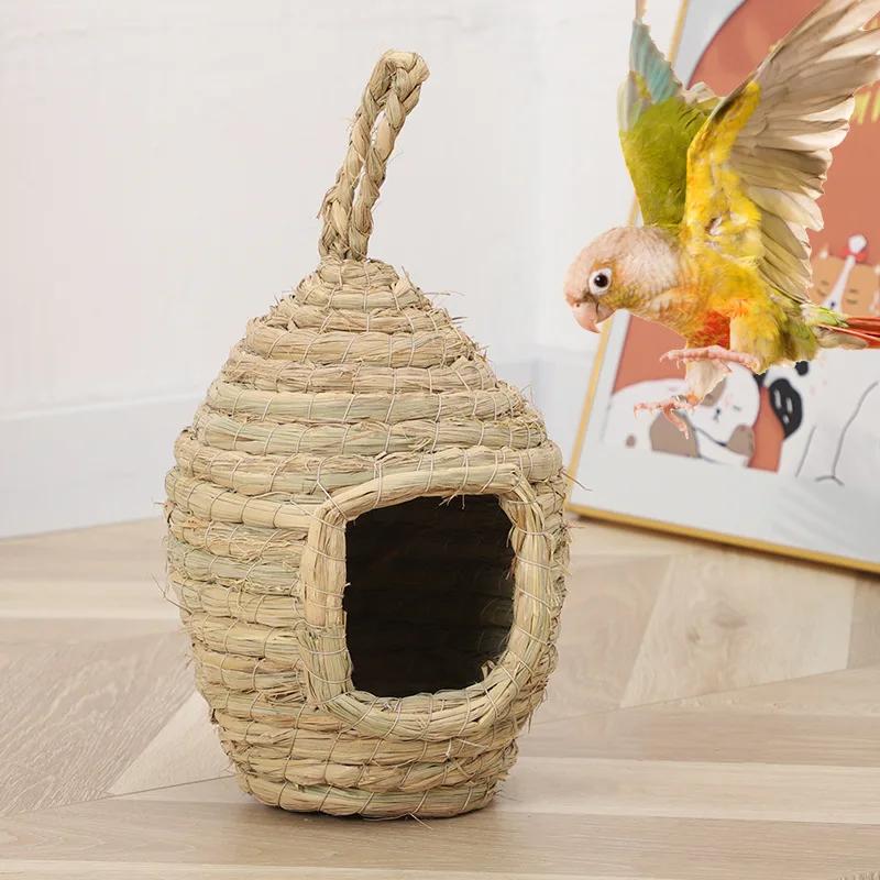 

Handwoven Straw Bird Nest Parrot Hatching Outdoor Garden Hanging Hatching Breeding House Nest Birds Accessory Bird Cages 25x15x18 CM