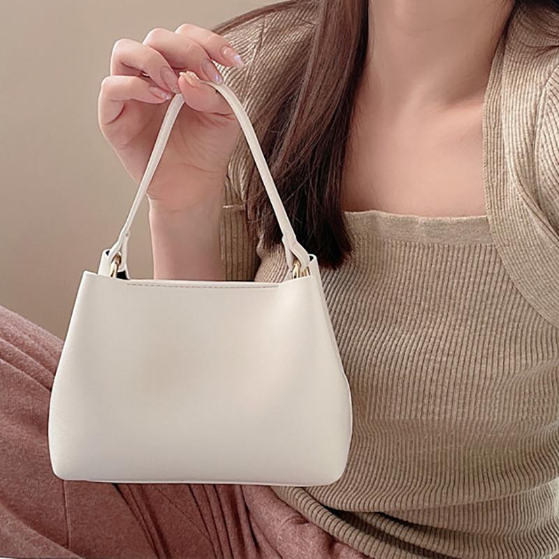 Niche PU Leather Women's Bucket Bag Pretty Pink Bucket Bag Mini Monochromatic Shoulder Bag Crossbody Bags Shopping and Traveling