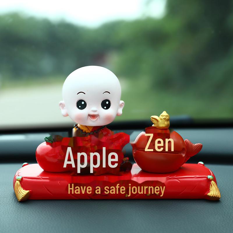 Creative Little Monk Maitreya Buddha Car Ornament: Cute, Shaking Head Resin Doll for Car Interior Decoration and Safety.