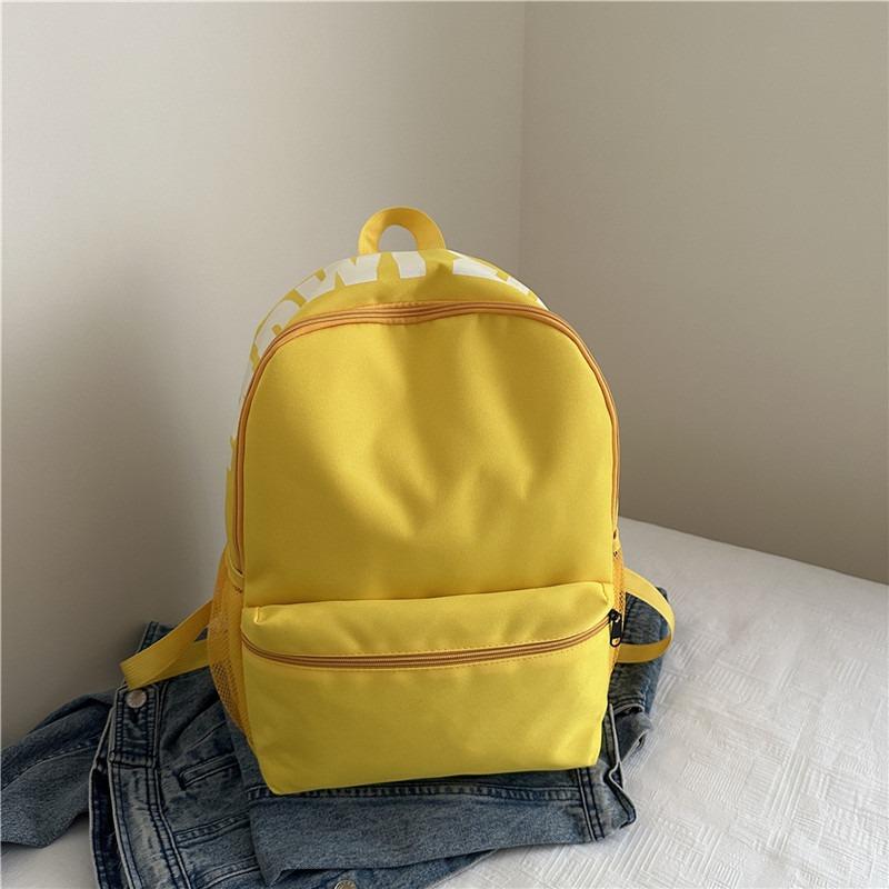 

Nylon solid color alphabet schoolbag, simple, lightweight, waterproof and wear-resistant backpack, class commuting large-capacity backpack