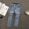Jeans Skinny Denim Dimagranti Strappati con Perline Europee per Donna - Collezione Estate 2026