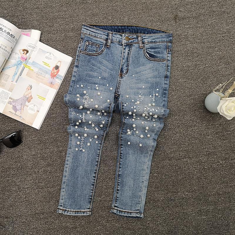 Jeans Skinny Denim Dimagranti Strappati con Perline Europee per Donna - Collezione Estate 2026