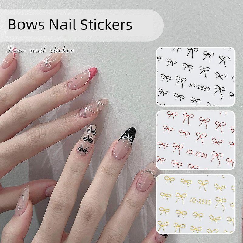 

Bows Black and White Red Ribbon Wear Nail Stickers One for each paragraph [6]]
