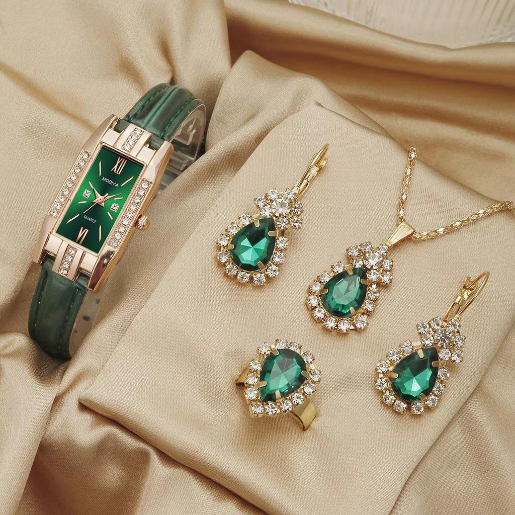 Vintage Schmuckset mit grünen Edelsteinen: Uhr, Halskette, Ohrringe und Ring