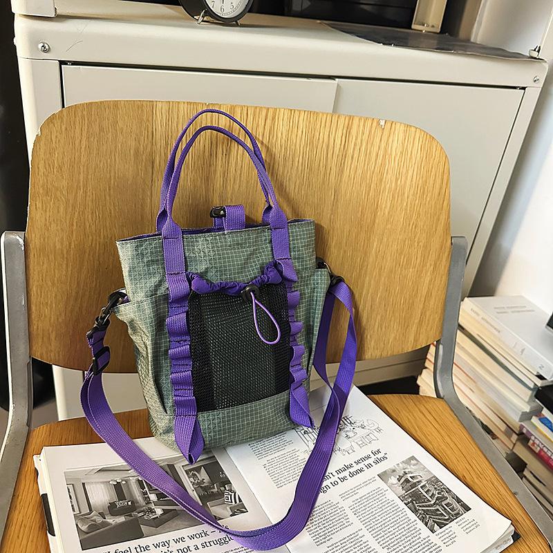

Japanese messenger bag women s personalized tooling trendy bucket bag men s sports small satchel light street shoulder bag student серый
