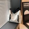 Tragetasche Damen neue Frühling beliebte Umhängetasche große Kapazität vielseitig Student Klasse Pendeln Messenger Bag