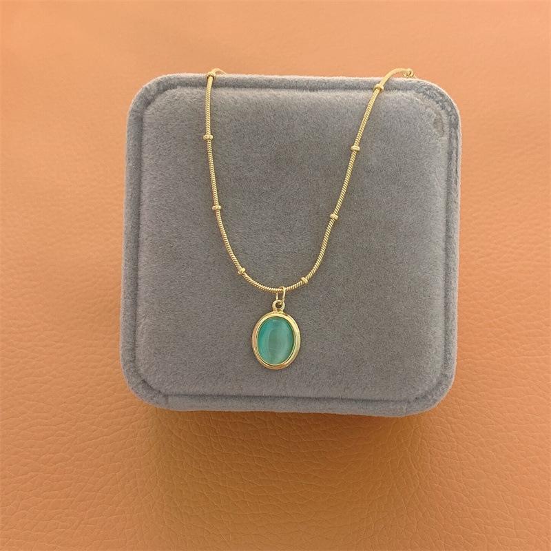 Lake Green Cat's Eye Necklace: Women's Simple Titanium Steel Clavicle Chain with Oval Stone and Freshwater Pearl Combination