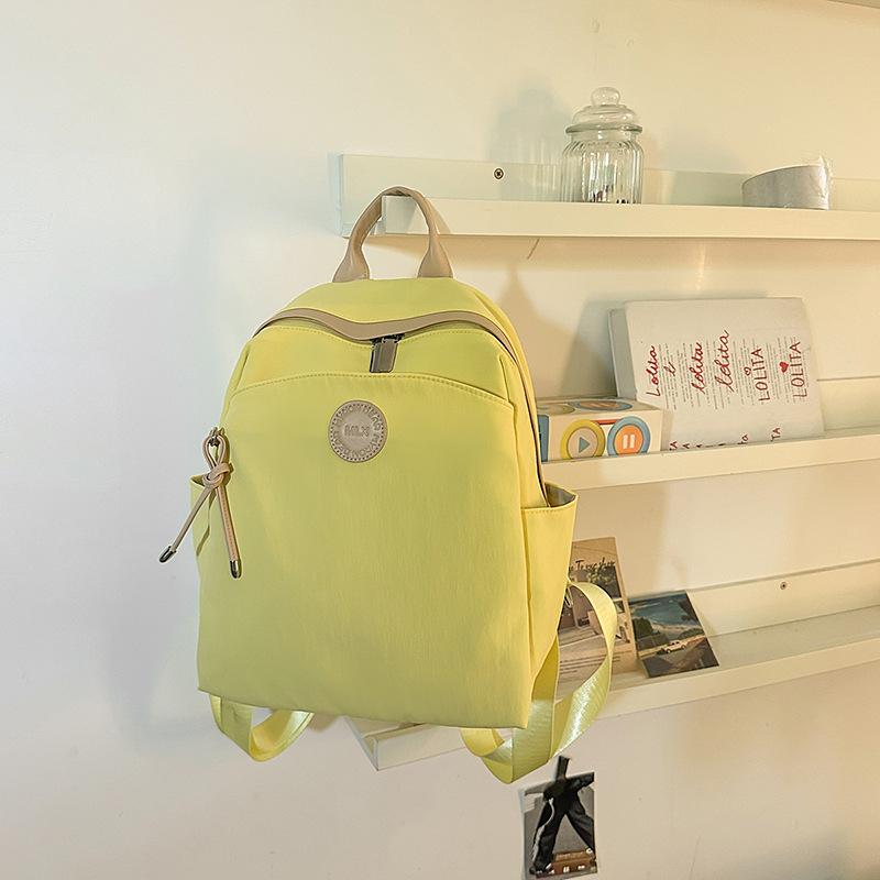 Lightweight and simple student backpack casual versatile lightweight travel shopping backpack