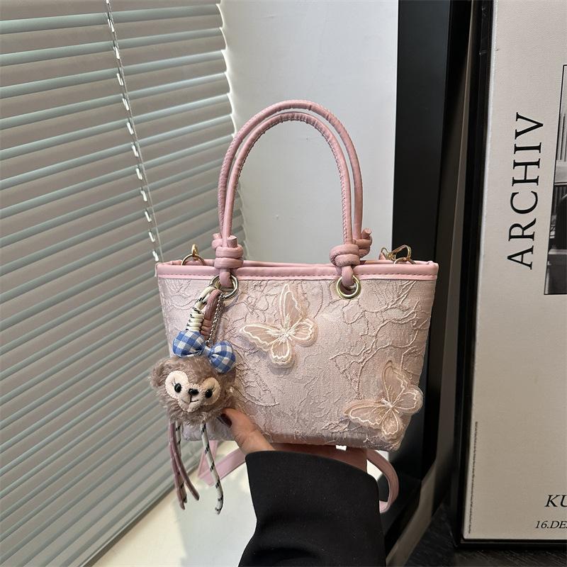 Super fire niche embroidered bag women's 2025 new summer versatile messenger bag fashionable portable bucket bag