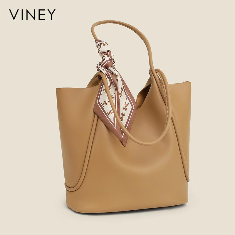 

Bag 2025 new bag women s bag tote bag spring and summer large-capacity commuting leather bucket shoulder bag коричневий
