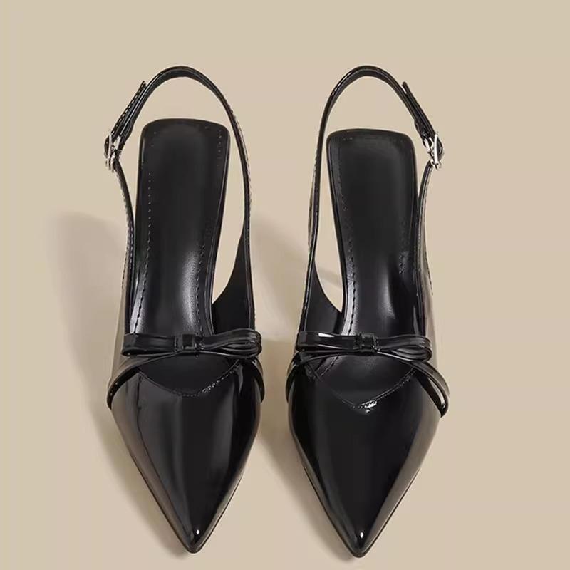 French bag head sandals women's 2025 summer new white patent leather pointed head temperament thin heel wear bow shoes
