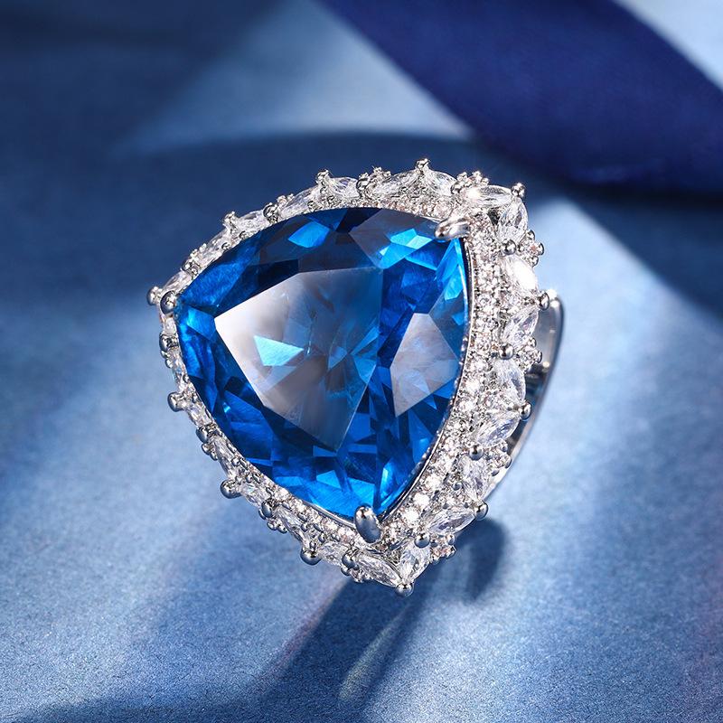 

Autumn and winter new Huabi jewelry copper bottom gold-plated simulation blue spinel advanced set 17 * 17-12 * 12
