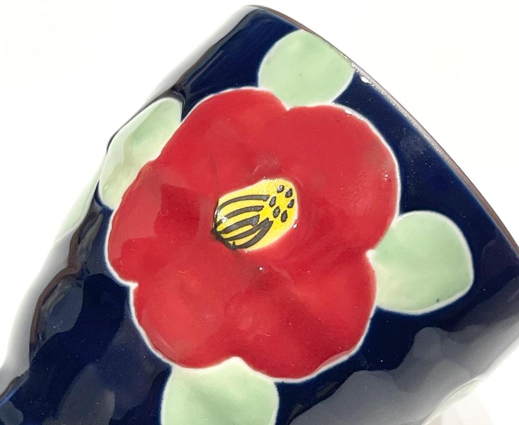 Hasami ware teacup, hand-painted by Yamashita Touen, with a glazed camellia design, navy.
