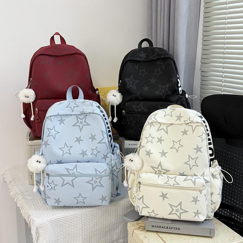 Schultasche neuer bedruckter Rucksack, frischer Studenten-Rucksack mit großem Fassungsvermögen und Entlastung für Frauen, blinkender Modetrend Fünfzackstern-Rucksack