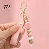 Anti Oxidation Metal Keychain Silicone Flower with Faux Leather Wristlet, Car Key Holder Ring Pendant, Handbag Backpack Charm Wood Beads Aesthetic
