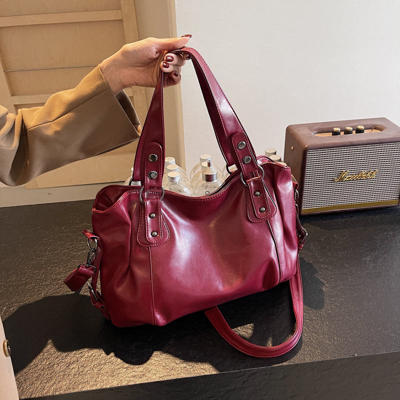 Retro solid color large-capacity tote bag commuter women's bag is available in batches