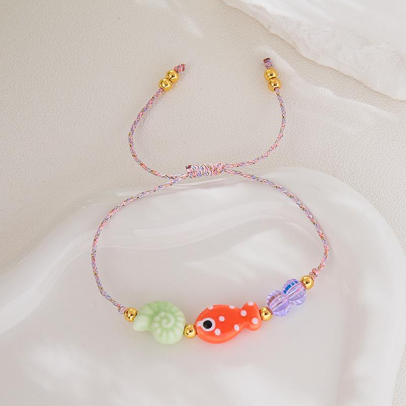 Bohemian Handmade Braided Rope Bracelet with Small Fish and Conch Charms