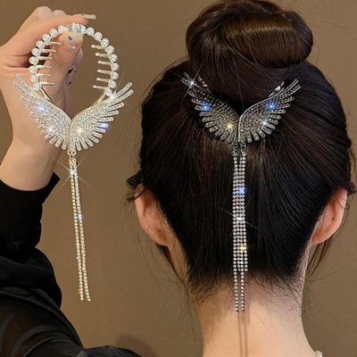 Fermaglio per capelli con nappa ad ali d'angelo per code di cavallo e chignon