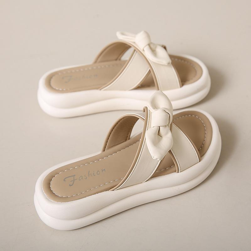 

Stepping on shit slippers women s models 2025 summer new models wear versatile thick-bottomed bows with skirts one-word sandals tide 40