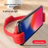 Creative Thumb Holder: Portable Desktop Tablet & Phone Stand for Lazy Users