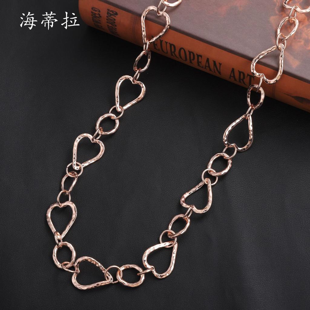 New hollow love ring long necklace, irregular peach heart women's simple and versatile metal sweater chain