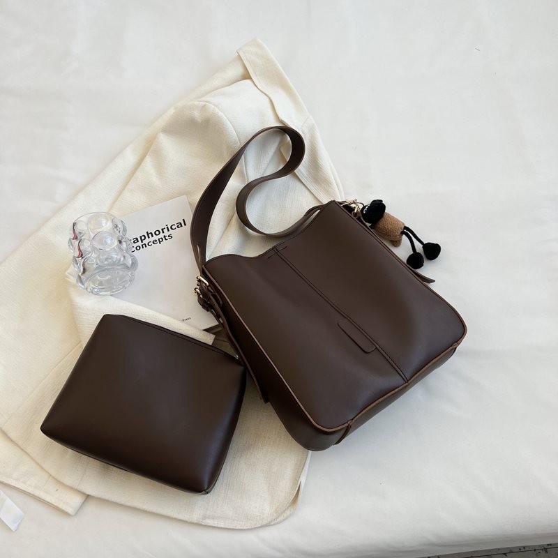 

Trendy Large Capacity Soft Leather Tote Bag For Women With Elegant Design Available In Coffee With Pendant Coffee Pendant