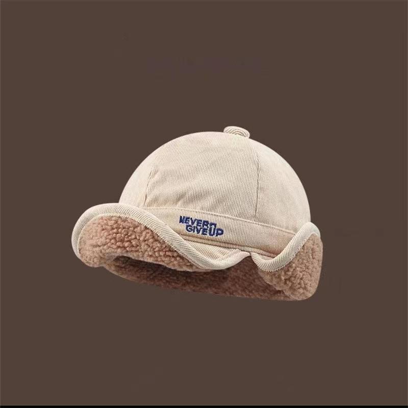 Fleece-lined, warm, and ear-protecting baseball cap for women, featuring letter embroidery and corduroy fabric, designed for cold weather