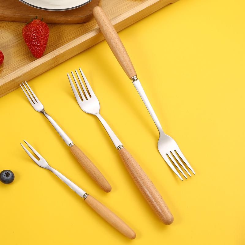 Rustfritt stål trehåndtak Knivgaffel Hjemmerestaurant Frukt Isskje Suppe Risskje Spisepinner Bestikk til kjøkkenbestikk