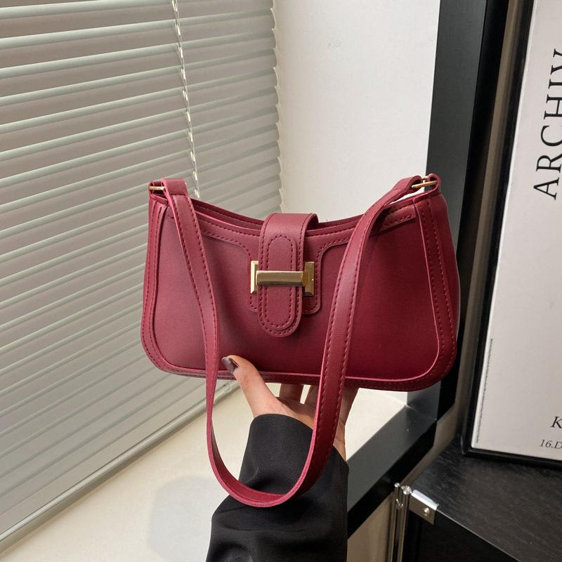 

Spring and summer new versatile temperament women s solid color high-end texture commuting armpit bag women s hand carry portable shoulder bag красный