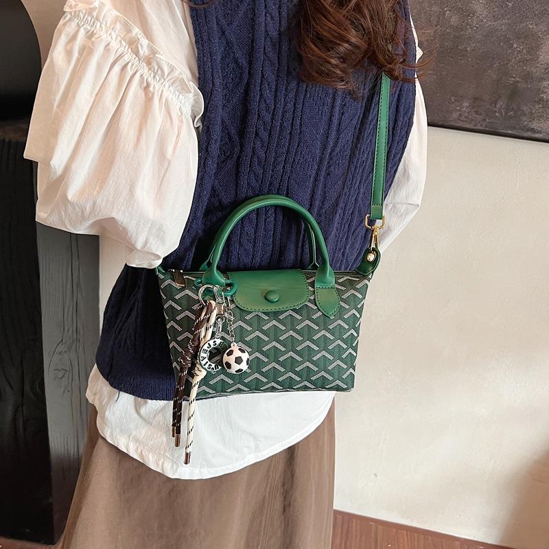 

2025 new light luxury dragon inlaid explosive leopard print portable shoulder crossbody women s bag contrasting color dumpling bag 24*8*14