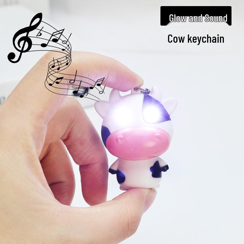 Luminous Cow Pendant Keychain: Sound & Light Accessory for Phones, Backpacks, and Luggage