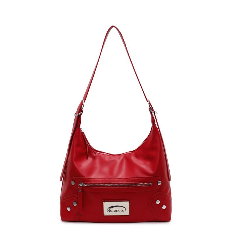 Fashion high-grade texture pu rivet large-capacity women's commuter bag exquisite locomotive underarm shoulder messenger bag