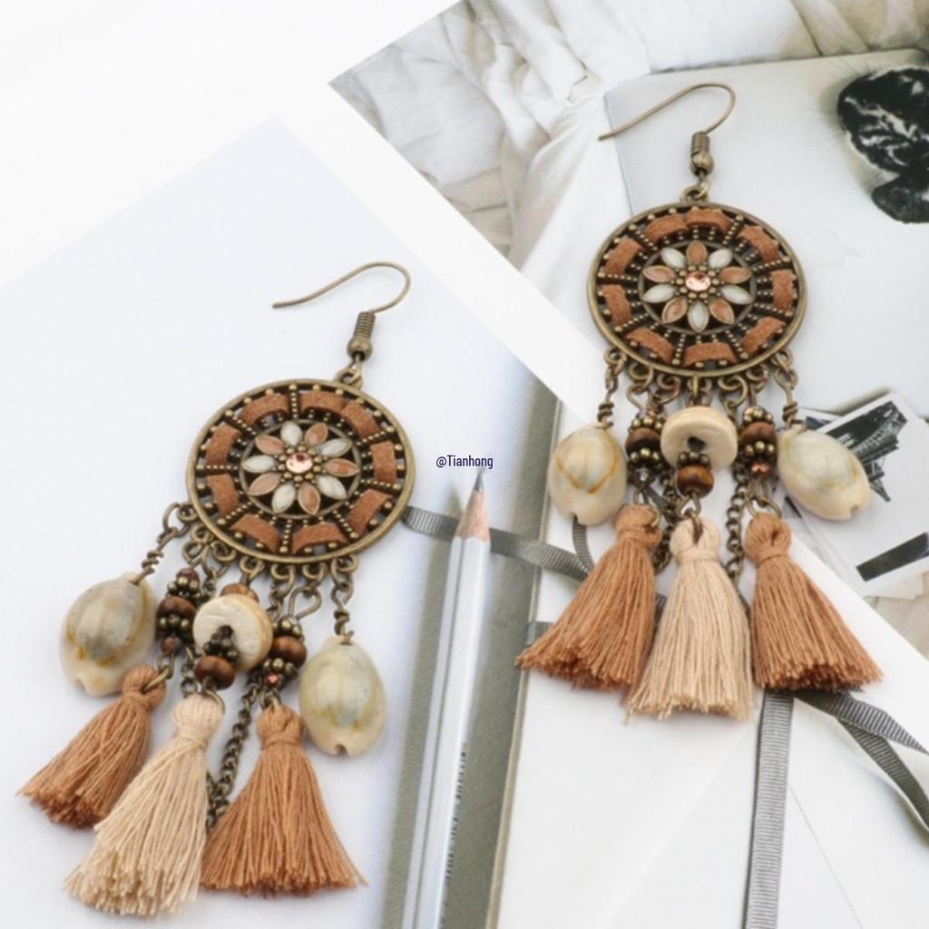 Yunnan Ethnic Bohemian Feather Earrings - Exaggerated No-Pierce Clips for Women