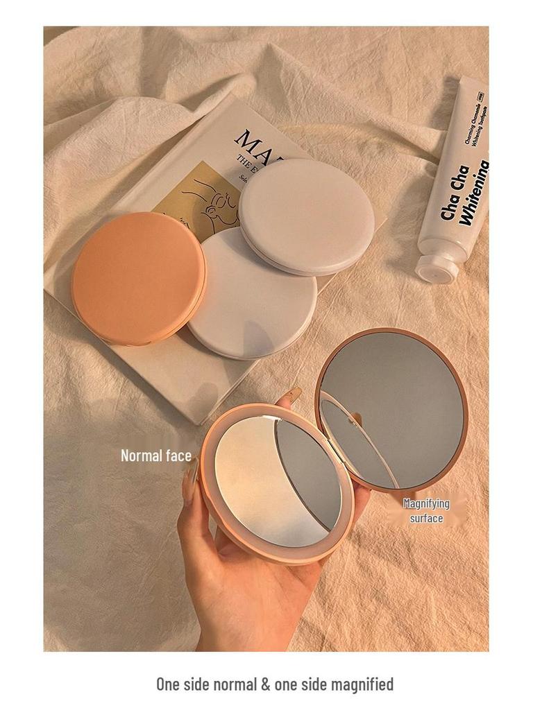 Portable LED Light Makeup Mirror - Compact, Handheld, Foldable, Round Mirror with Touch Light for Carry.