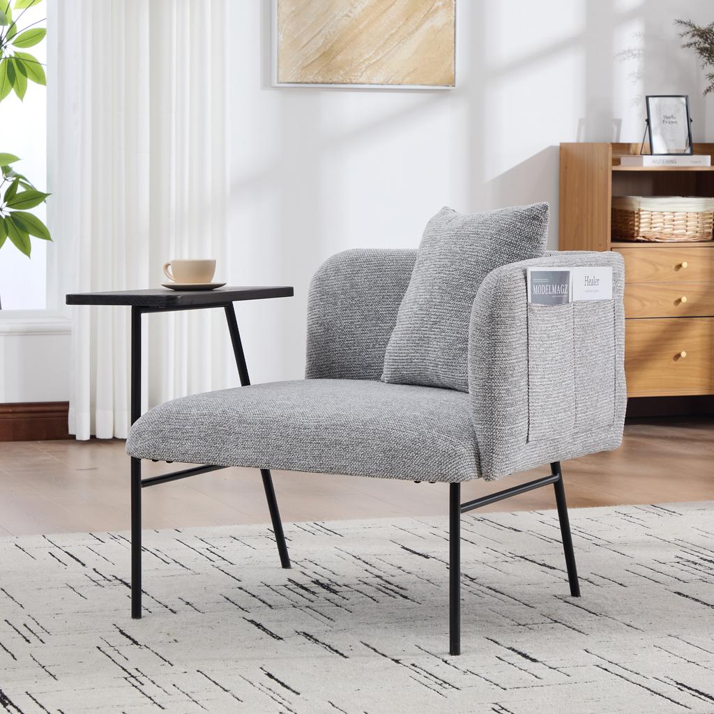 Modern single armchair with comfortable fabric backrest and two storage compartments, complemented by a practical side table.