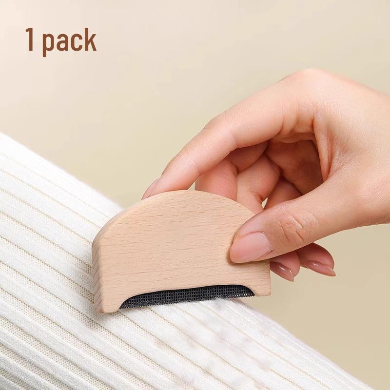 

Машинка для удаления катышков и кашемировая расческа для шерстяной одежды Wood Handle Lint Remover [1 pc]