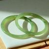 Elegant Chinese Style Jingle Bracelet: Ice-Transparent, Non-Fading Round Bangle Collection
