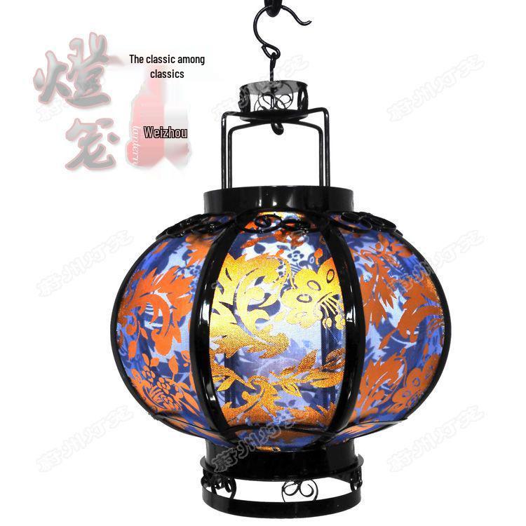 Retro Chinese Iron Art Lantern with Phoenix Tail Design