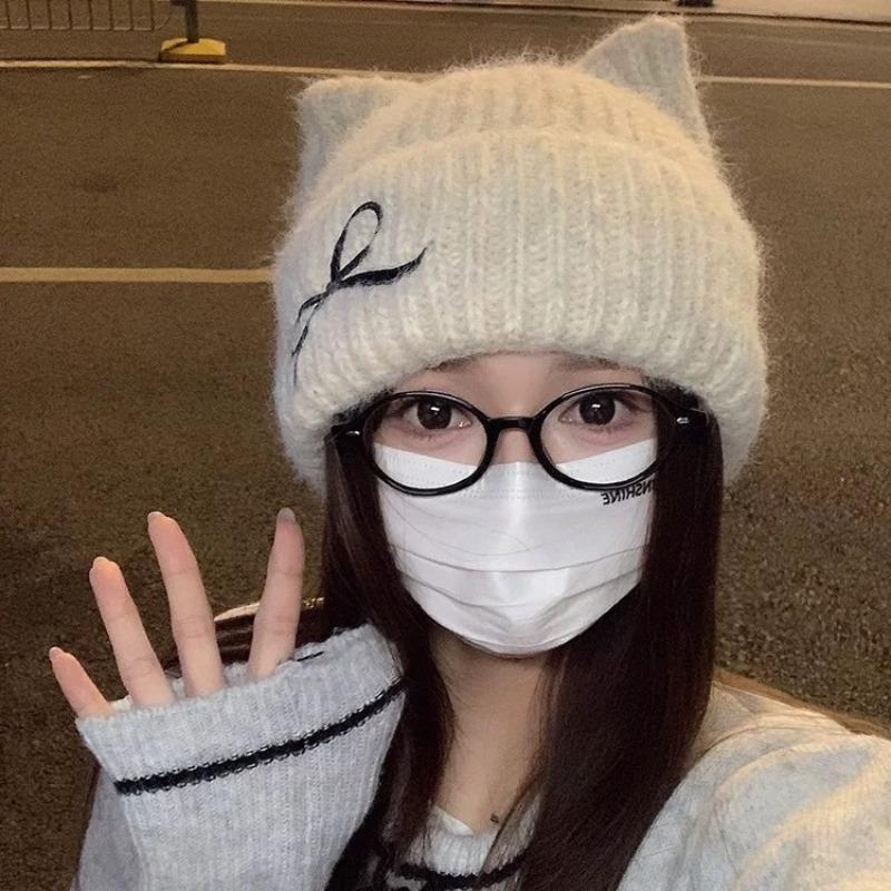 Hat female cute cat ears autumn and winter new knitted hat winter warm bow show face small cold hat wool hat