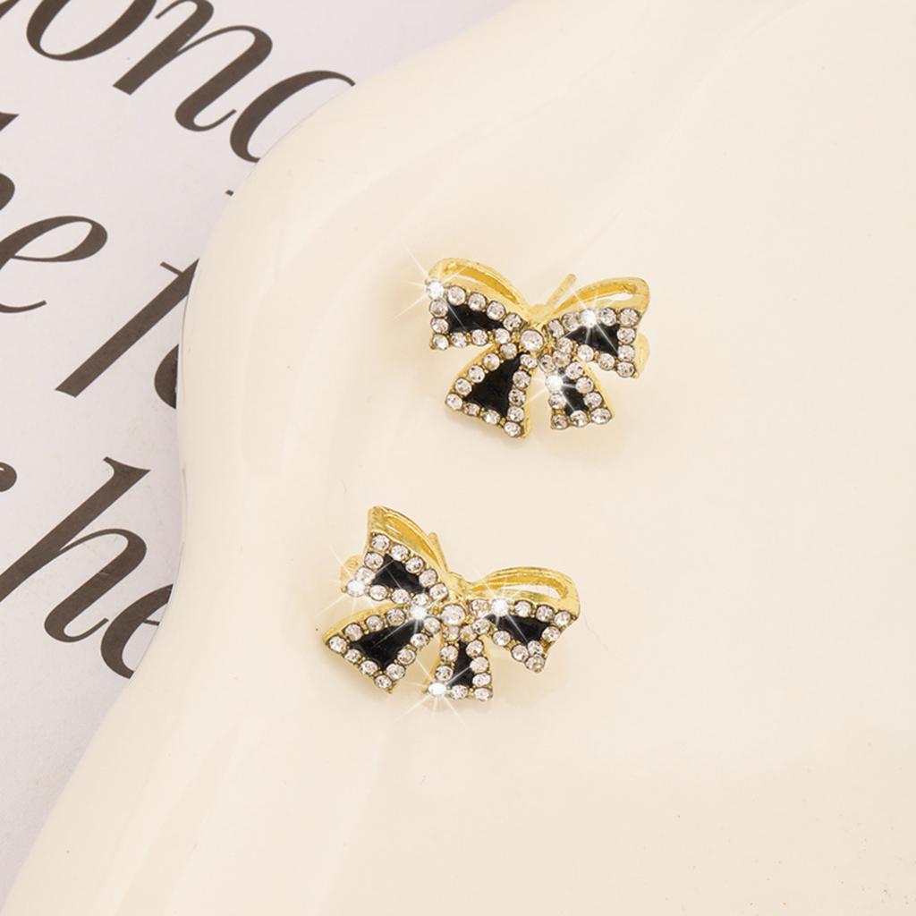 High-end Women's Butterfly Diamond Stud Earrings, Elegant And Versatile Black Drip Earrings With Bow Design.