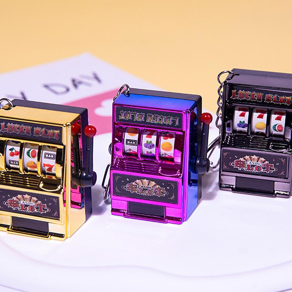 Kreatives Spielbares Mini Glücksspielautomat Schüttel-Lotteriemaschine Transfer-Spiel Schlüsselanhänger Anhänger Simulationstasche