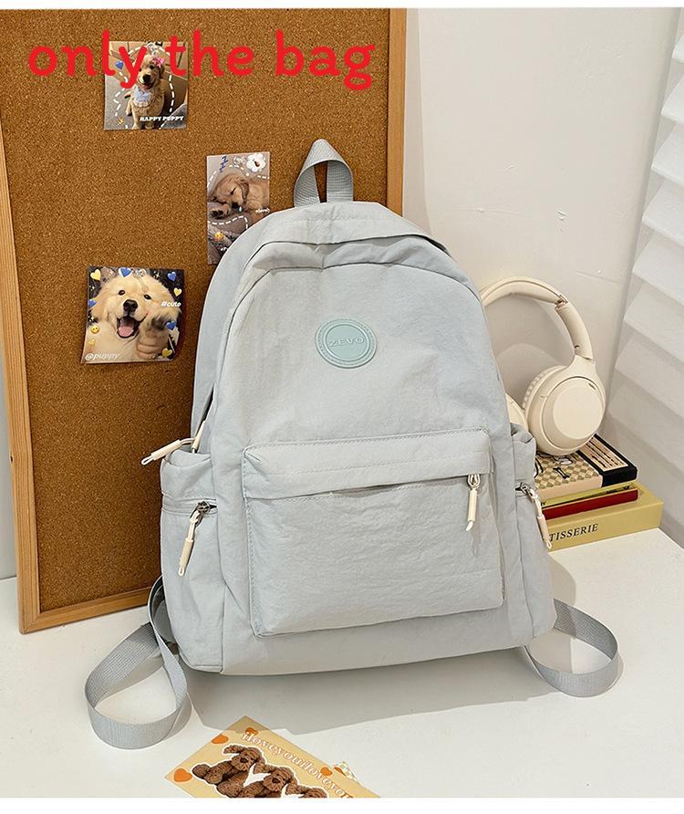 Fashionable Outdoor Ladies Backpack With Alphabet Decoration And Solid Color Design For Commuting