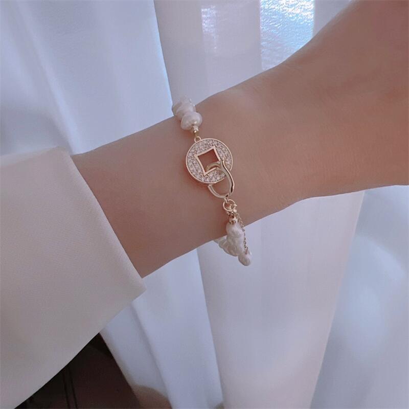 Yuhé Pearl Baroque Bracelet, a brand-new design featuring a money clip for attracting wealth14k Gold-plated for color retention, featuring a unique