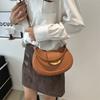 Early out of the new fashionable texture shoulder armpit bag retro bag women's solid color casual messenger saddle bag tide