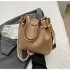 Bag Women's 2025 New Retro Fashion Simple Texture Bucket Bag Versatile Solid Color Shoulder Messenger Commuter Bag