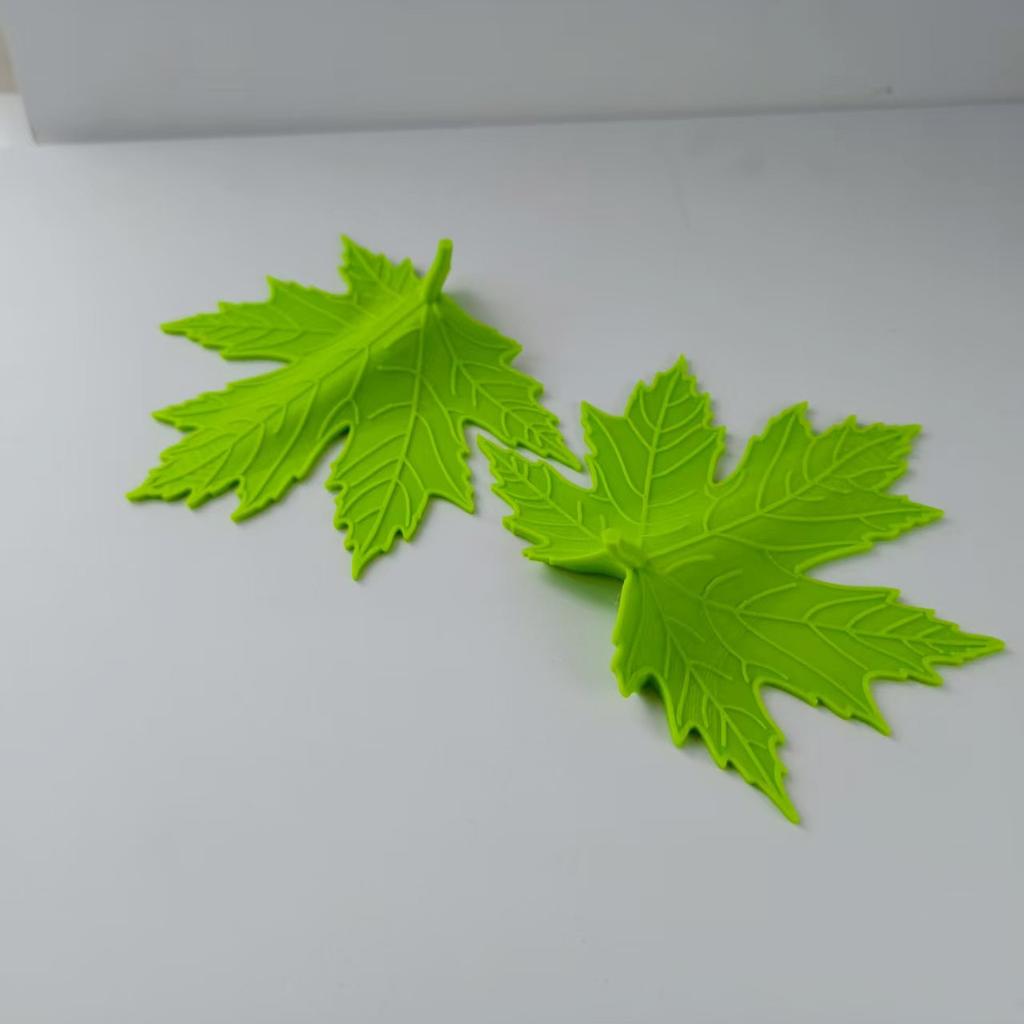 1 Stück Kleiner, niedlicher, minimalistischer Türstopper mit Blattdesign. Ein künstlerisches und praktisches Heimdesign-Werkzeug, geeignet für Türspalte von 3 mm bis 13 mm.
